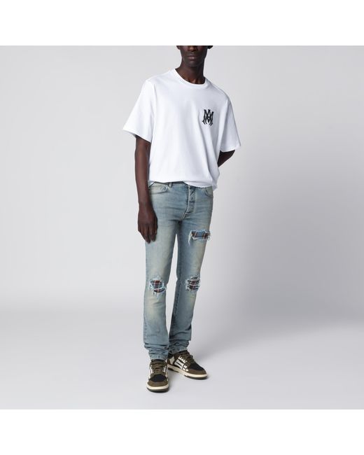 Amiri Blue Mx1 Distressed Flannel-Patched Jeans for men