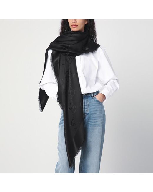 Foulard sfrangiato in gg jacquard di Gucci in Black
