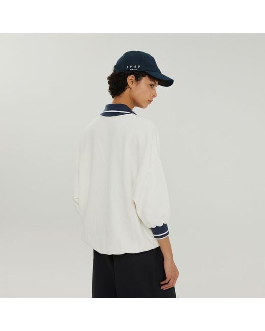 1989 STUDIO White Jp V-Neck Sweatshirt
