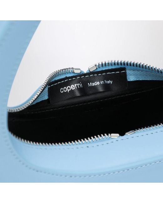 Micro baguette swipe bag azzurra in pelle di Coperni in Blue