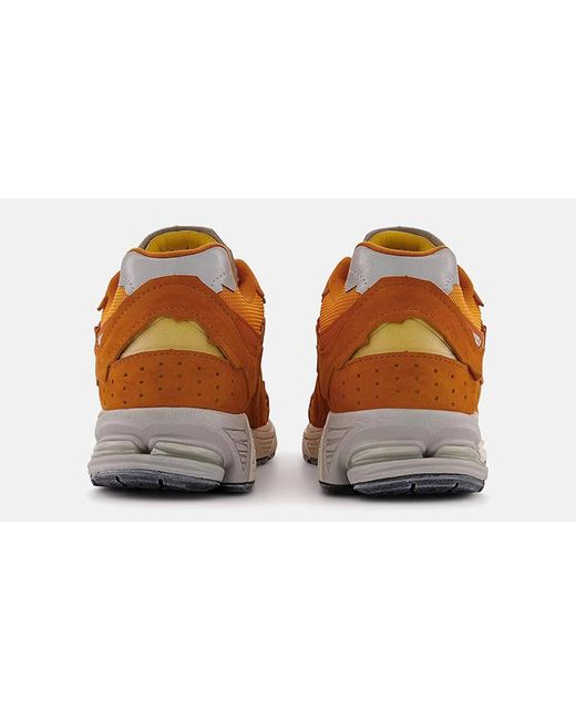 New Balance 2002r Protection Pack Vintage Orange in Brown Lyst