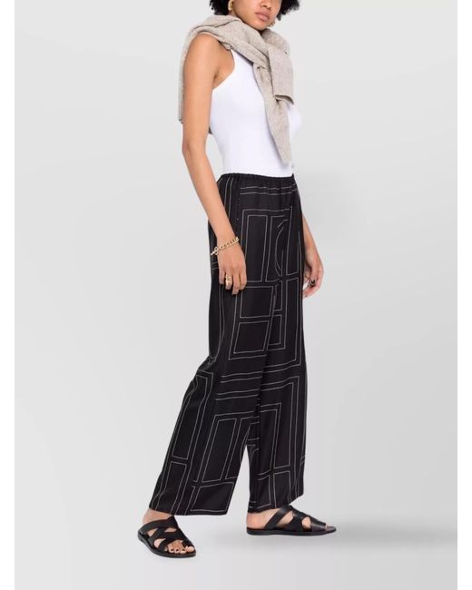 Totême Blue Silk Monogram Wide-Leg Pajama Trousers