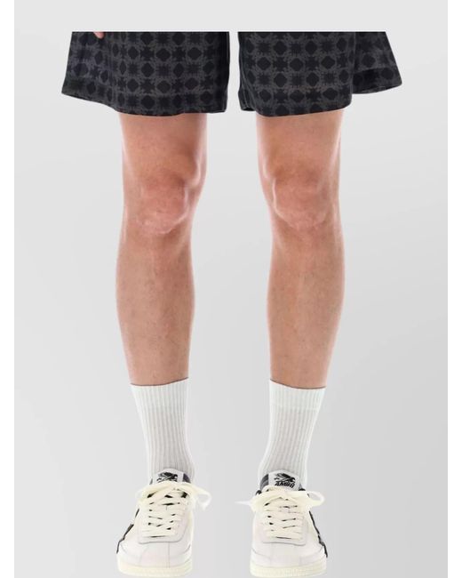 Amiri Black Viscose Floral Print Bermuda Shorts for men