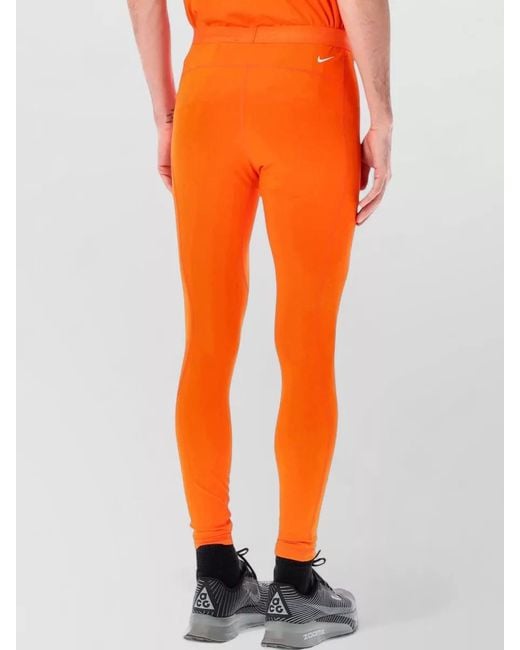 Nike Orange Acg Performance Stretch Fitted Leggings for men