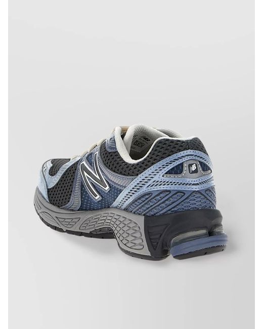 New Balance Blue 860 Low-Top Sneakers