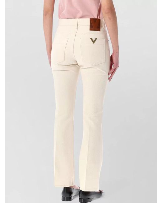 Valentino Garavani Pink Denim Regular-Rise Slim-Fit Flared Jeans
