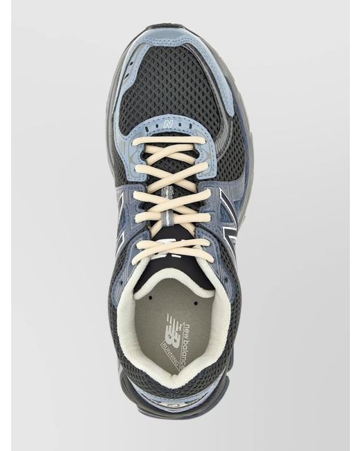 New Balance Blue 860 Low-Top Sneakers