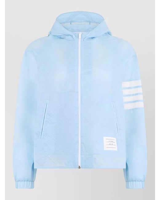 Thom Browne Blue Hooded Ripstop Jacket Featuring Graphic Sleeve