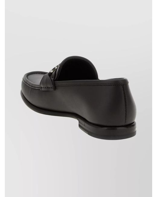 Ferragamo Black Round Toe Loafers Featuring Metallic Buckle for men