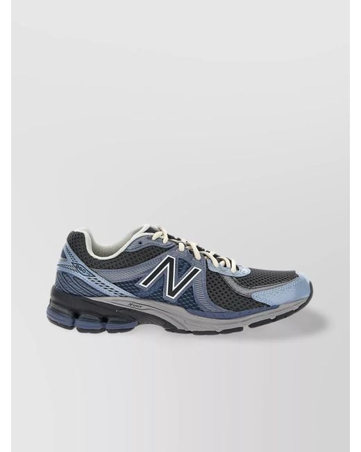 New Balance Blue 860 Low-Top Sneakers