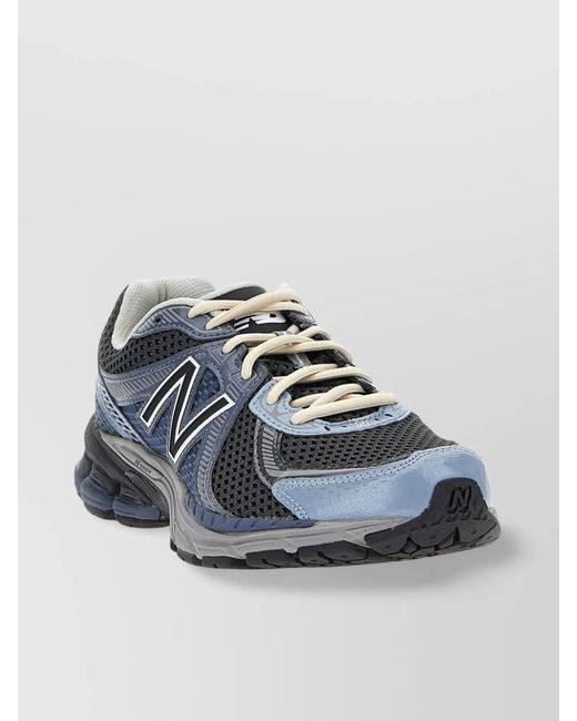 New Balance Blue 860 Low-Top Sneakers