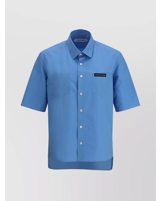 NAMACHEKO Blue Modern Asymmetric Hem Shirt With Patch Pockets for men
