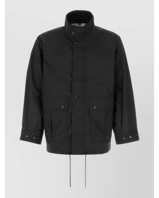 Nanamica Black Nylon Windbreaker Coat Drawstring Hem Pockets