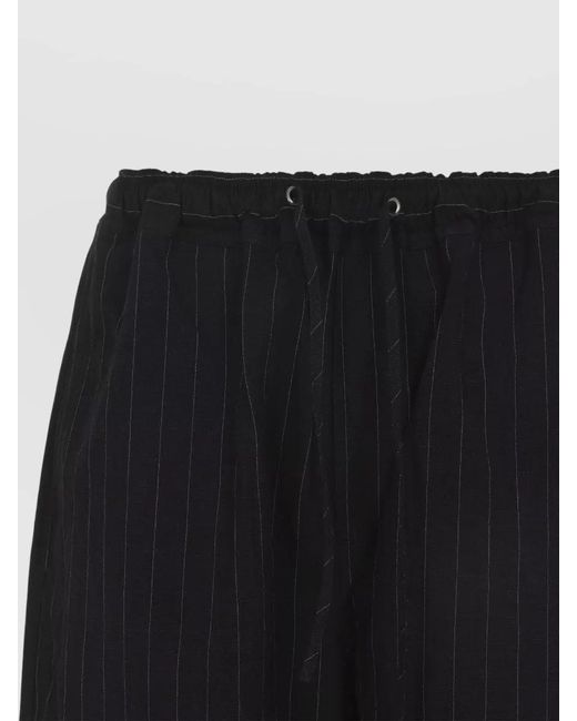 Studio Nicholson Black Pinstriped Relaxed-Fit Wide-Leg Trousers for men