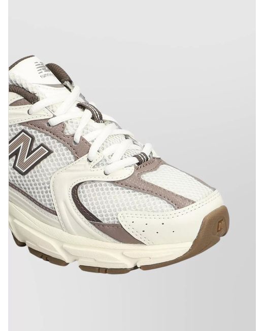 New Balance Metallic Leather Low-Top Sneakers
