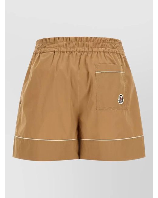 Moncler Natural High-Rise Pleated Flared Cotton-Blend Tailored Shorts