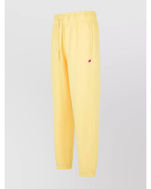 New Balance Yellow Cotton Track Pants for men