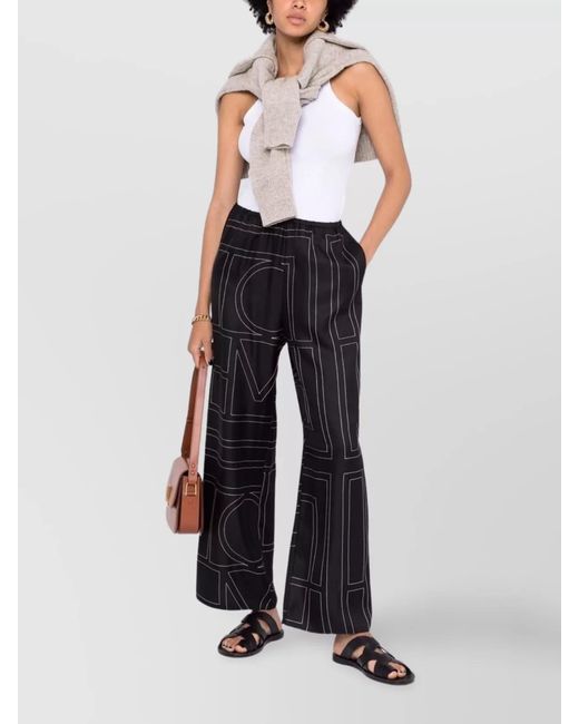 Totême Blue Silk Monogram Wide-Leg Pajama Trousers