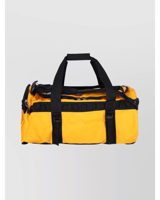 The North Face Yellow Suitcase