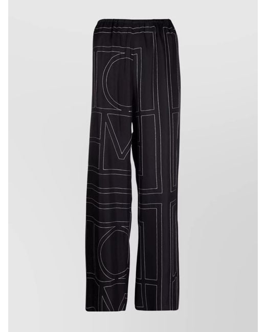 Totême Blue Silk Monogram Wide-Leg Pajama Trousers