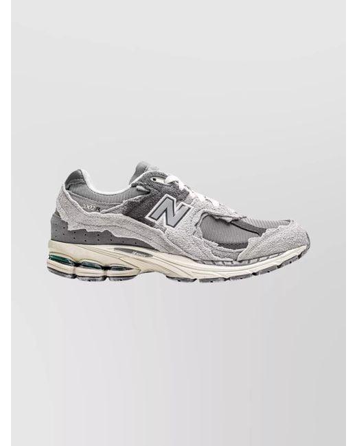 New Balance Metallic Suede Leather Paneled Low-Top Sneakers for men