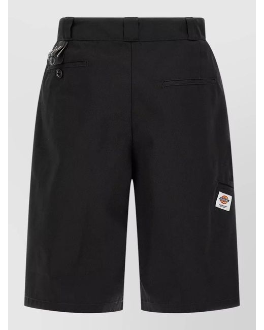 Undercover Black Asymmetric Bermuda Shorts for men