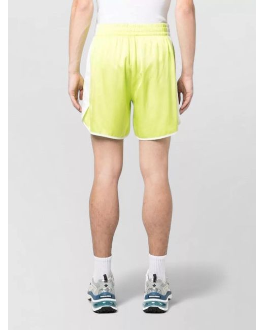 BLUE SKY INN Yellow Viscose Satin Track Shorts for men