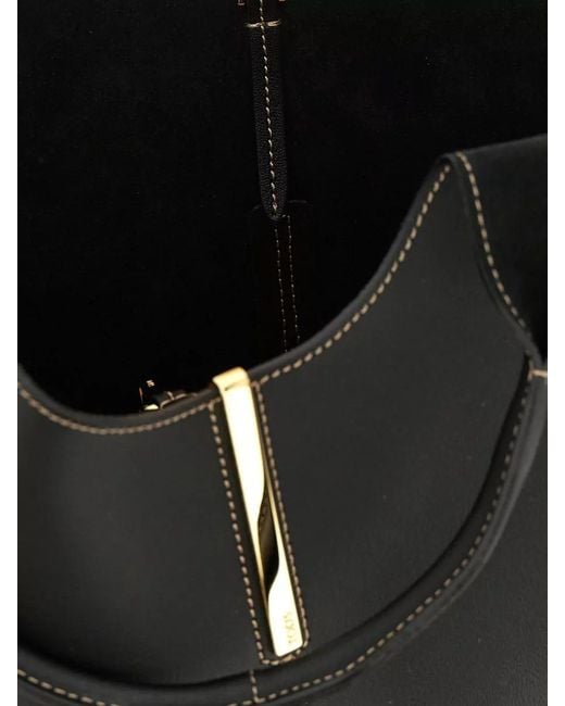 Tod's Black Small Metal Plate Shoulder Shopping Bag