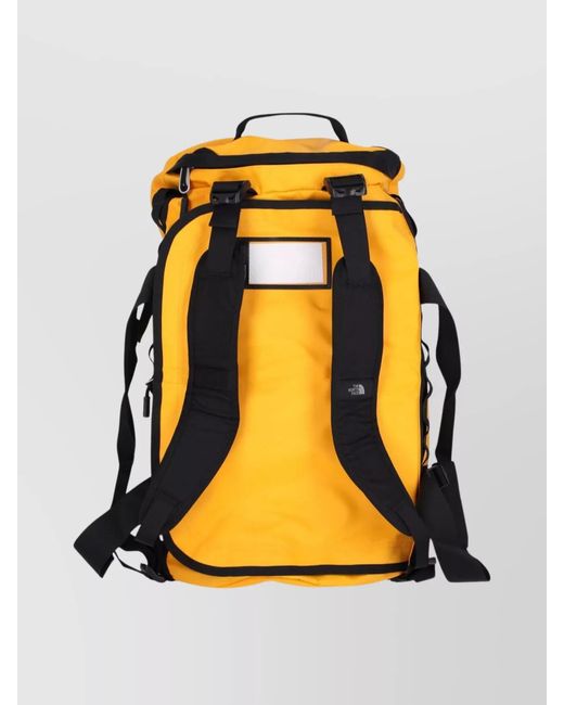 The North Face Yellow Suitcase