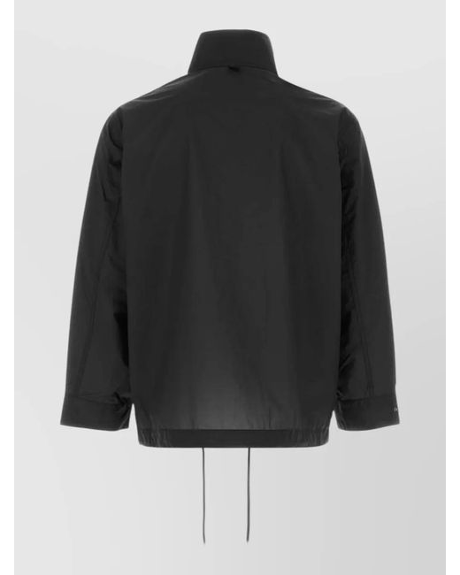 Nanamica Black Nylon Windbreaker Coat Drawstring Hem Pockets