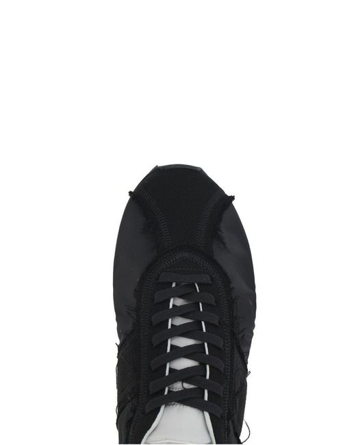 The Row Black Sneakers