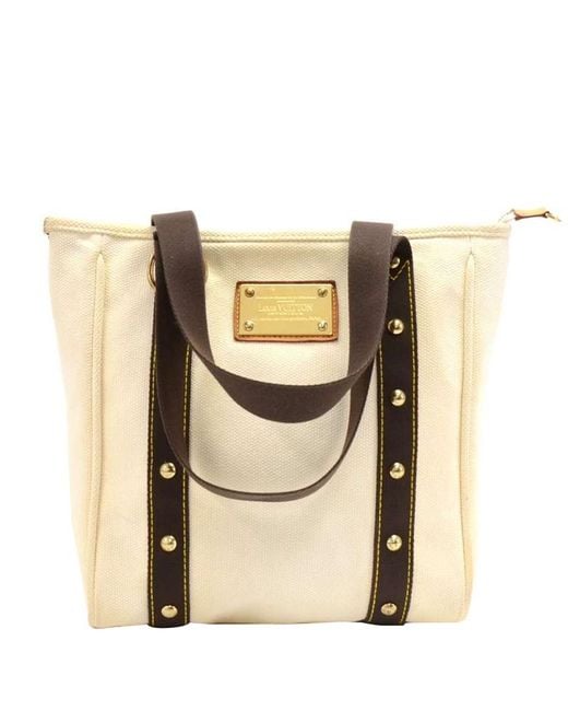 Louis Vuitton Off White Canvas Antigua Cabas Mm Bag in Cream (Natural) - Lyst