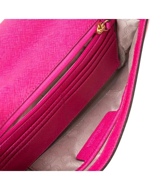 magenta clutch bag