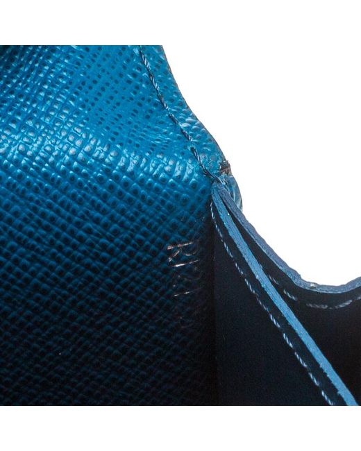 Louis Vuitton Cyan Epi Leather Wallet in Blue - Save 2% - Lyst