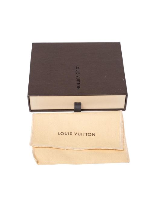 Louis Vuitton Porte Cles Swing Gold Tone Bag Charm in Metallic - Lyst