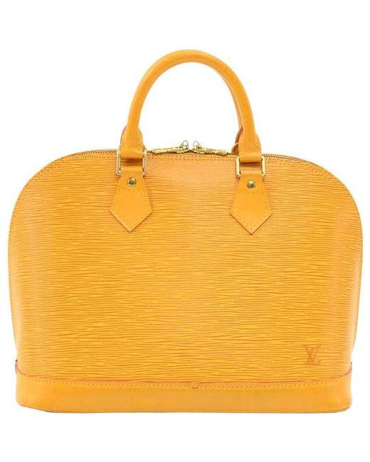 Louis Vuitton Tassil Yellow Epi Leather Alma Pm Bag - Lyst