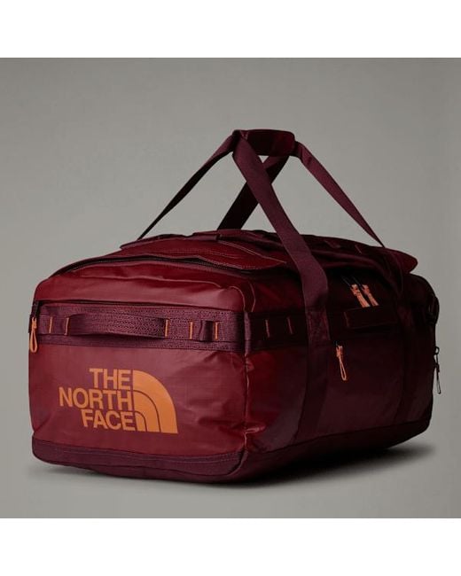 The North Face Red Base Camp Voyager Duffel 62L for men