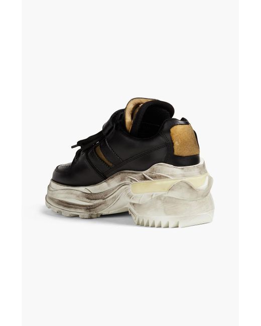 Maison Margiela Black Artisanal sneakers aus leder in distressed-optik mit überstehender sohle