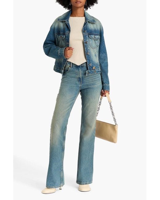 Courreges Blue Hoch sitzende bootcut-jeans in ausgewaschener optik