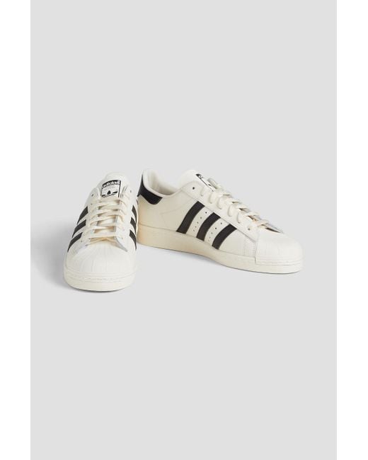 Adidas Originals White Superstar 82 Striped Leather Sneakers for men