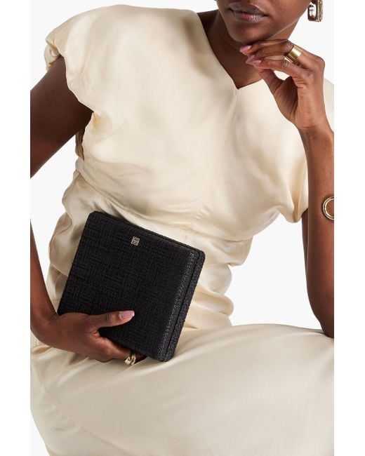 Totême  Black Clutch aus tweed