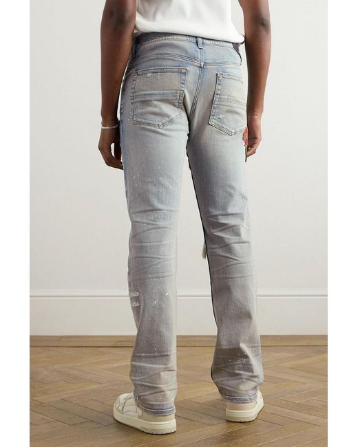Amiri Blue Skinny-Fit Appliquéd Distressed Paint-Splattered Jeans for men