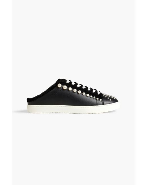 stuart weitzman slip on sneakers