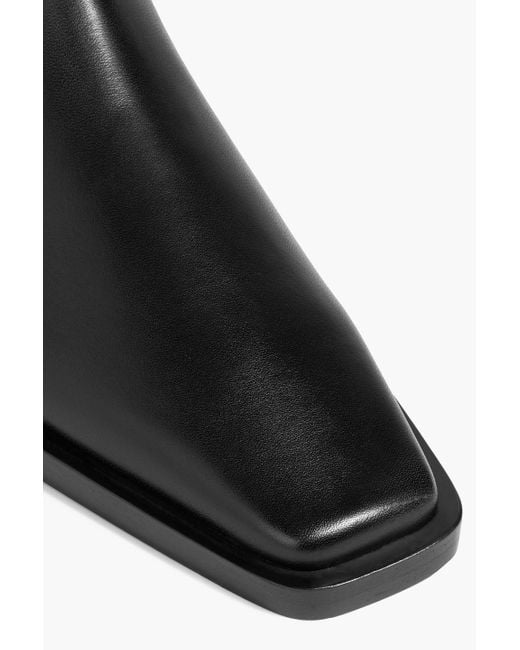 Totême  Black Buckled Leather Ankle Boots