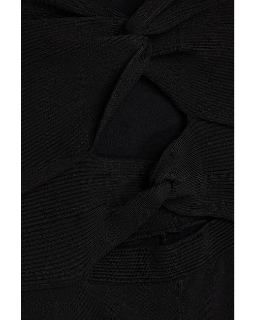 Sandro Black Gestrickter cropped jumpsuit mit cut-outs und twist-detail