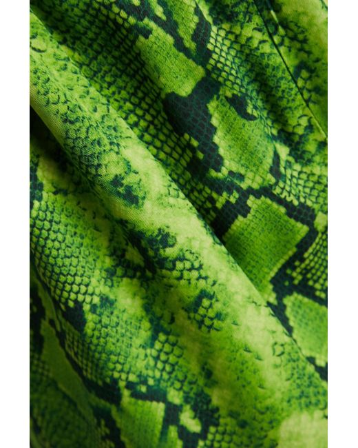 Stine Goya Green Fatou hose mit weitem bein aus einer TM-mischung mit schlangenprint