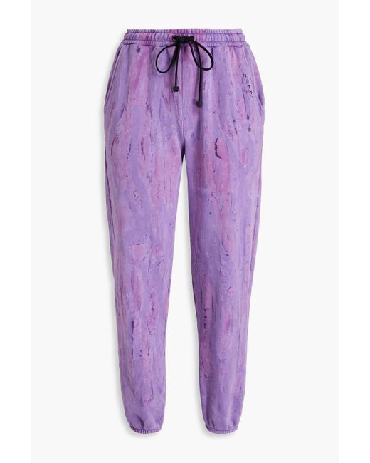 Koral Purple Oblivion track pants aus frottee aus einer baumwollmischung mit print
