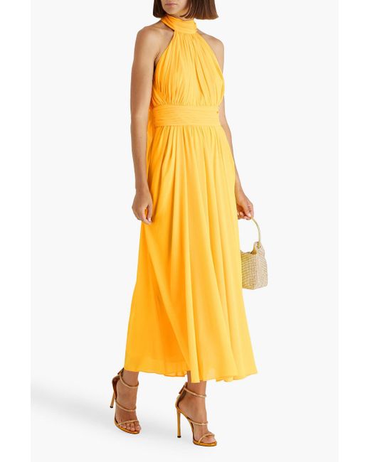 alanui crochet dress Amalfi – Alora Boutique and a body black tight dress Oscar de la Renta Color:Almendras
