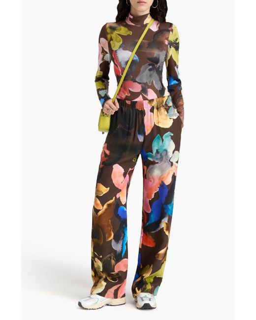 Stine Goya Brown Hose mit weitem bein aus einer TM-lyocellmischung mit floralem print
