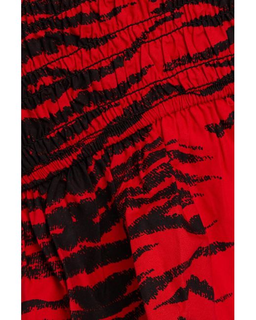 Ganni Red Oberteil aus baumwollpopeline mit schößchen, tigerprint und raffung